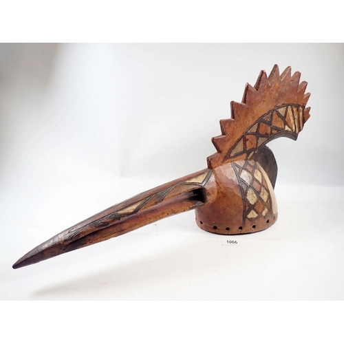 1153 - A carved Mossi bird mask from Burkino Faso with long beak and large crest, 70cm long