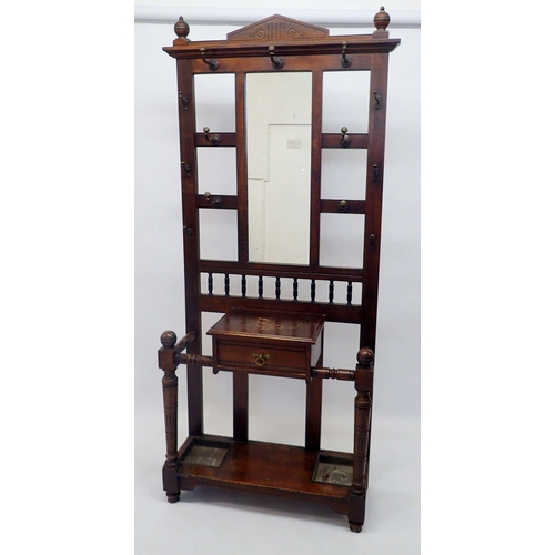 1155 - An Edwardian hallstand with hat hooks, glove box and stick stands