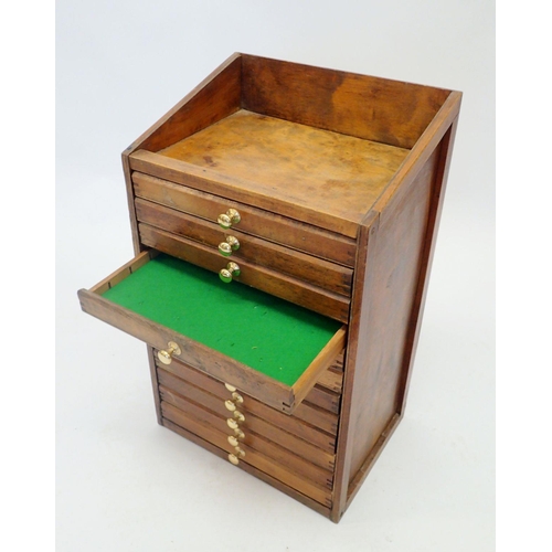 1186 - A collectors table top cabinet of twelve drawers, 59 x 36 x 27cm