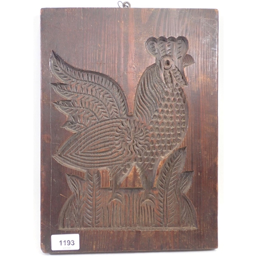 1193 - A 19th century carved pine gingerbread mould of a cockerel, 34 x 25cm