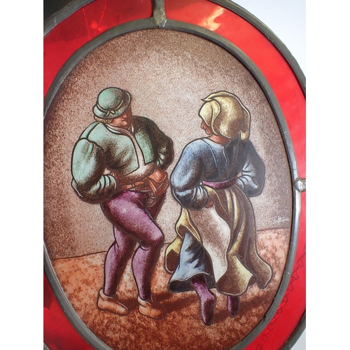 1194 - Two stained glass oval panels depicting couple country dancing and two bagpipers, 35 x 28cm