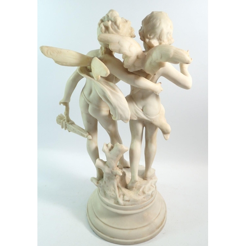 1195 - A 19th century alabaster group of cupid and young girl, 43cm tall