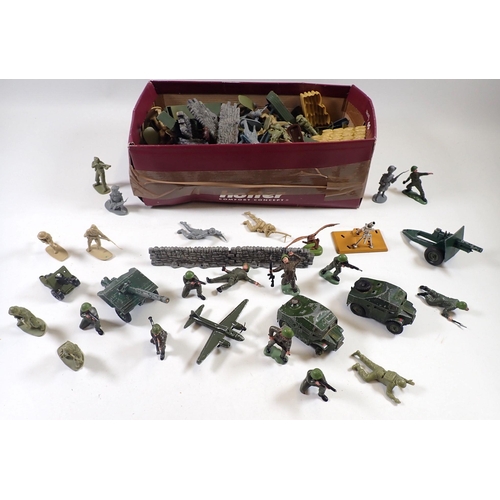 1218 - A box of plastic toy soldiers including some Britains