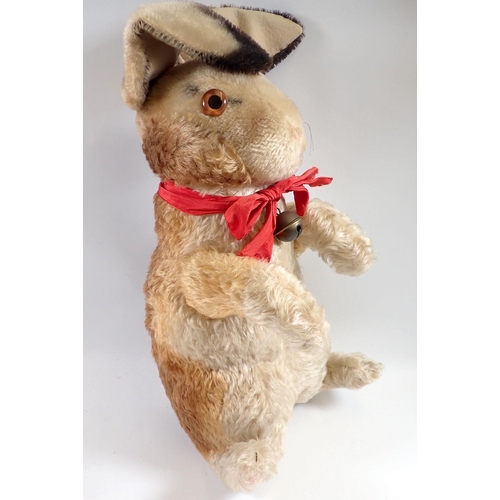 1228 - A large Steiff begging rabbit with swivel head and glass eyes, 42cm without ears