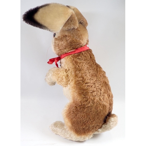 1228 - A large Steiff begging rabbit with swivel head and glass eyes, 42cm without ears