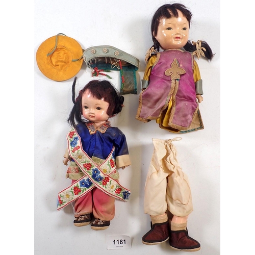 1229 - A pair of papier mache 1920's Japanese dolls in silk costumes, 22cm