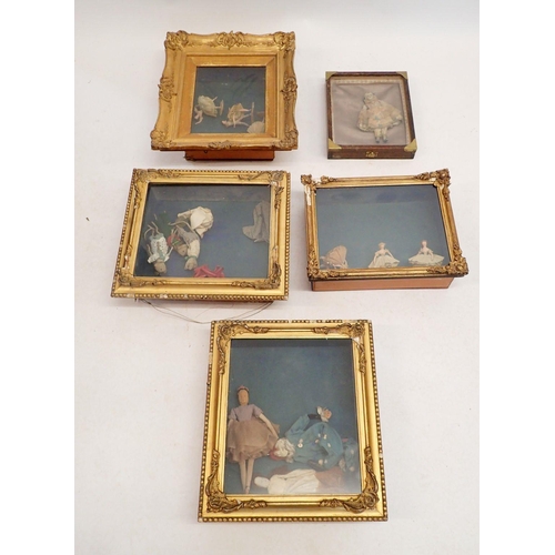 1236 - A collection of antique and later dolls etc in boxed frames, largest 39 x 35cm