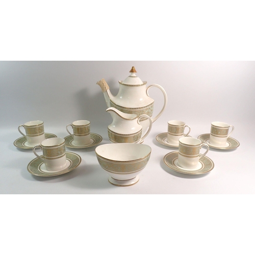 124 - A Royal Doulton English Renaissance coffee set comprising - six cups and saucers, coffee pot, milk a... 