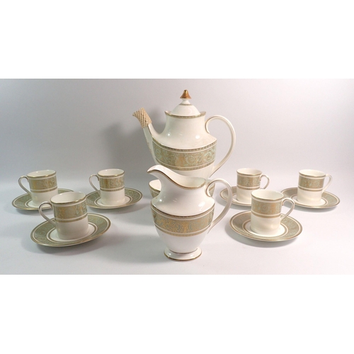 124 - A Royal Doulton English Renaissance coffee set comprising - six cups and saucers, coffee pot, milk a... 