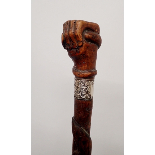 1306 - An Australian carved wood hand and snake walking stick with silver collar, Birmingham 1901, 84cm