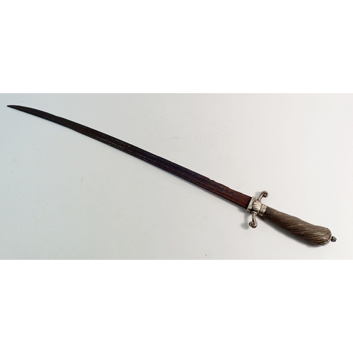 1308 - A continental antique sword with silver mounted carved horn hilt, 70cm long