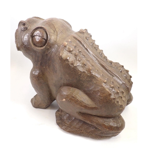 1312 - A large carved wooden frog, 24cm tall