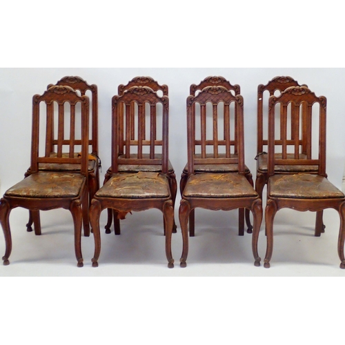 1322 - A set of eight French slat back dining chairs with trellis and scrollwork carved top rail