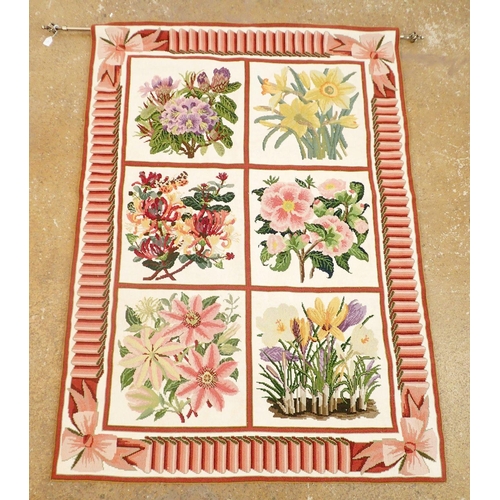 1326 - A large handmade tapestry wall hanging depicting six sectional floral displays with ribbon design bo... 