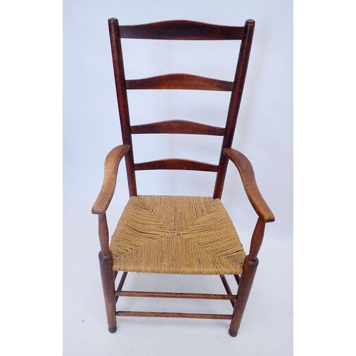 1332 - A 19th century country ladderback chair with ropework seat