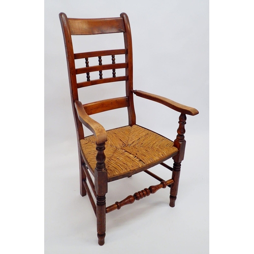 1333 - A 19th century spindle and rail back rush seated chair with turned front rail