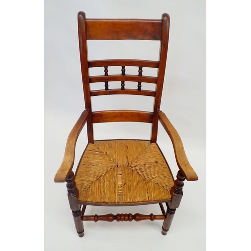 1333 - A 19th century spindle and rail back rush seated chair with turned front rail