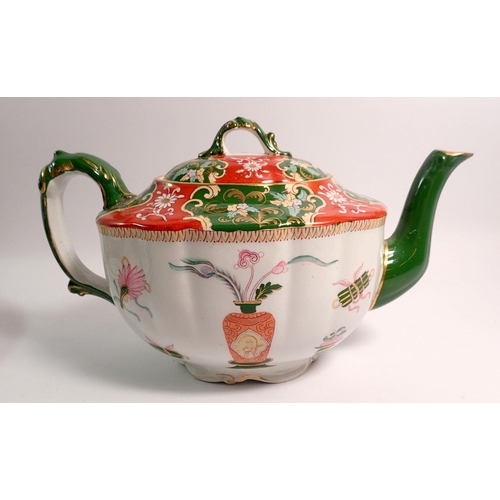 134 - A Victorian Ashworth ironstone plate, 27cm diameter and similar teapot decorated in chinoiserie styl... 