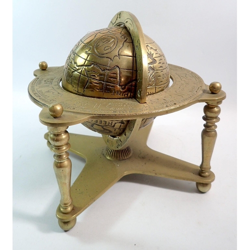 1355 - A brass table globe with zodiac signs, 25cm diameter