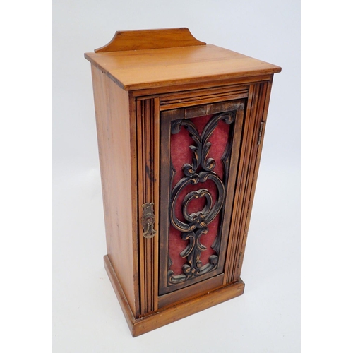 1356 - A Victorian bedside cabinet with scroll carved door, 33cm wide