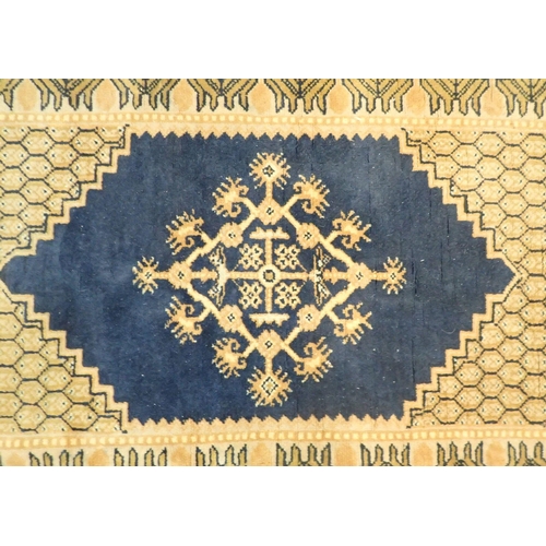 1363 - A Persian style rug with blue medallion on an ivory honeycombe ground rug 148 x 101cm