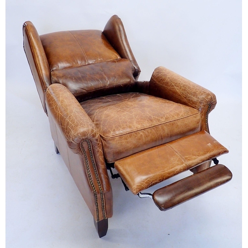 1368 - A leather finish recliner chair