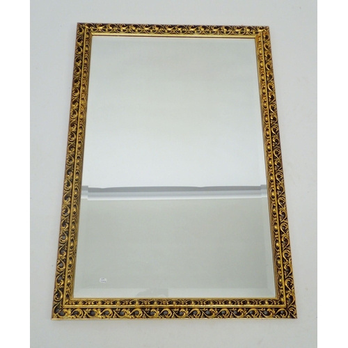 1372 - A gilt framed mirror, 56 x 82cm