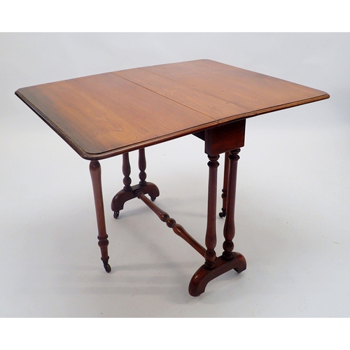 1373 - A Victorian mahogany Sutherland table on turned supports 76cm long