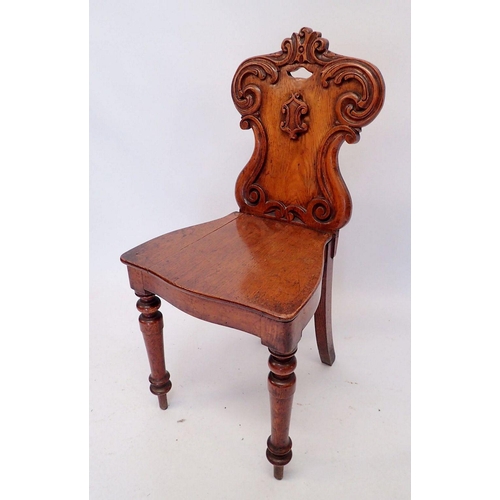 1376 - A Victorian mahogany shield back hall chair