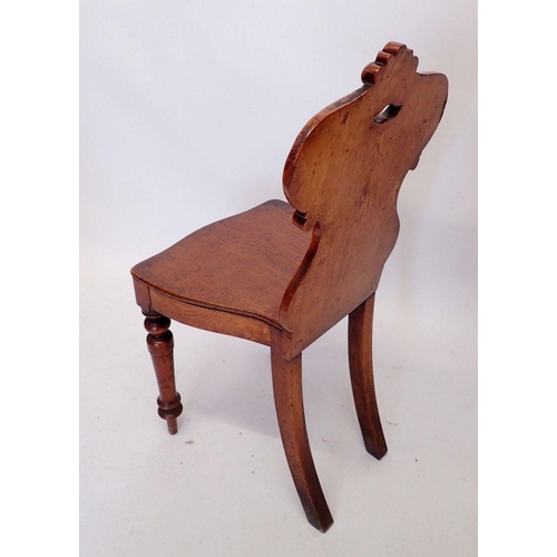 1376 - A Victorian mahogany shield back hall chair