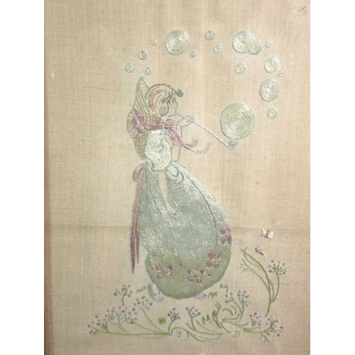 1381 - An Edwardian embroidered picture of a girl blowing bubbles, 28 x 19cm