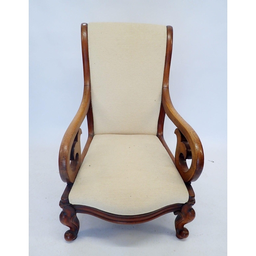 1402 - A Victorian mahogany framed open armchair with scroll back and arms, upholstered in oatmeal, on cabr... 