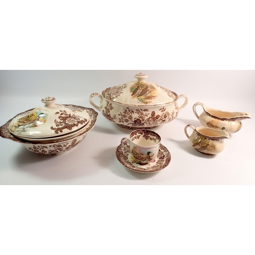 179 - A Palissy Game Series dinner service comprising six cups and saucers, milk jug, gravy boat, two cove... 