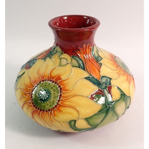 194 - A Moorcroft pottery Inca Sunflowers vase, signed to base, 10.75cm