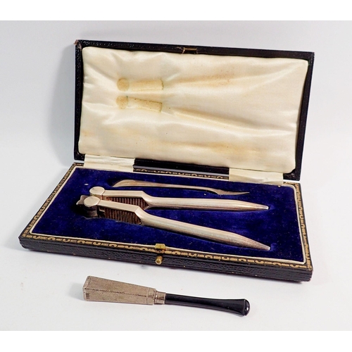 241 - A pair of James Dixon silver plated nut crackers and pick - boxed and a silver cigarette holder