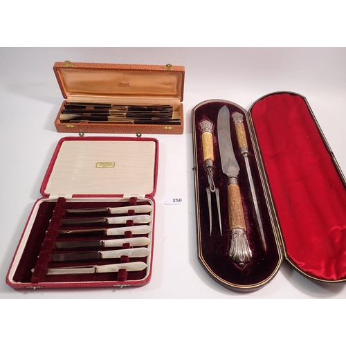 250 - A cased stag horn carving set with silver mounts and two cased sets of six knives