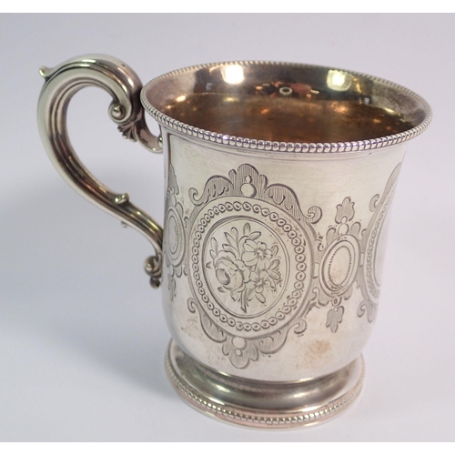 271 - A Victorian silver tankard with floral and blank engraved cartouches, London 1858, Edwards & John Ma... 