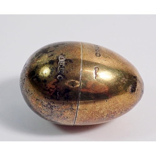 274 - A Victorian novelty silver egg form needle and thread case, 4.5cm, London 1875, Henry William Dee