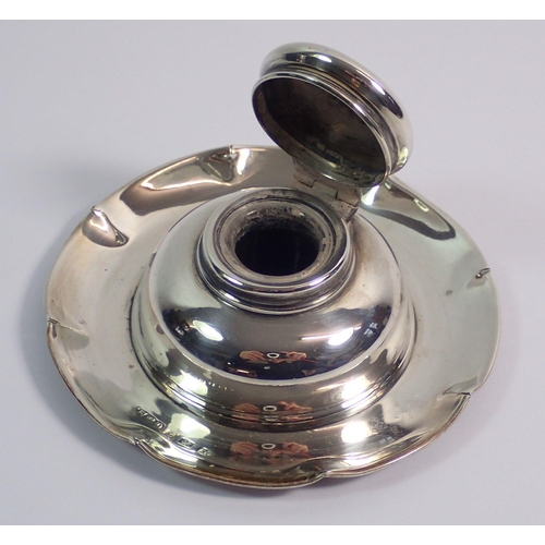 275 - A silver circular inkwell, 10cm diameter, Birmingham 1906