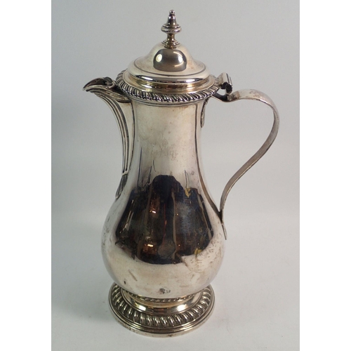 278 - A Georgian silver hot water jug, Thomas Chawner London 1774, 27cm tall, 662g