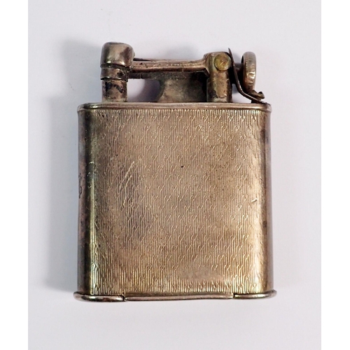 282 - A silver cigarette lighter, by Adie Brothers Birmingham 1931