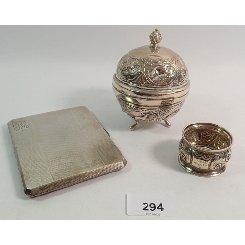 294 - A silver cigarette case, napkin ring and white metal spherical pot with embossed decoration, 195g si... 