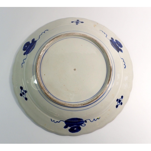 3 - A Japanese Imari charger with panel decoration, 40.5cm diameter