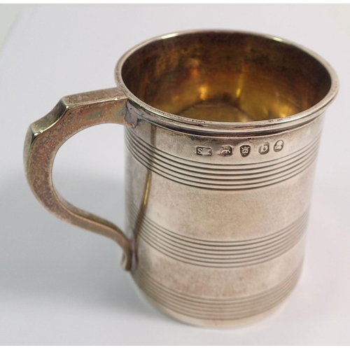 320 - A small Georgian silver reeded christening cup, London 1817 by Samuel Knight, 6.5cm tall, 84g