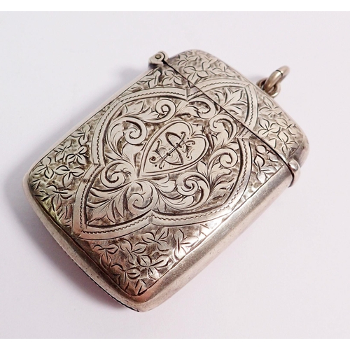 325 - A Victorian silver vesta case with all over engraved decoration, Birmingham 1892 by Spurrier & Co