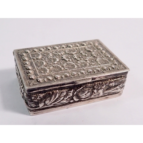 334 - A silver pill box with embossed floral and wheat decoration, 4cm wide, marked 925