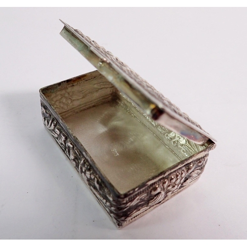 334 - A silver pill box with embossed floral and wheat decoration, 4cm wide, marked 925