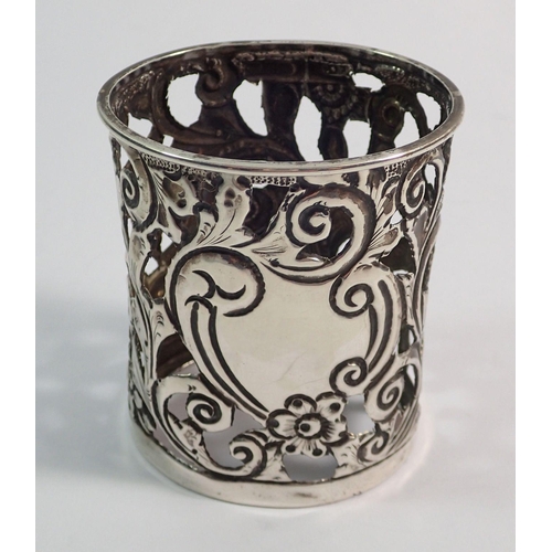 337 - A silver pierced and embossed napkin ring, Birmingham 1899, 6.7cm tall, 29g