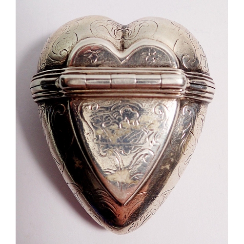 344 - A 19th century continental silver heart form box with engraved decoration, 5 x 4.3cm, 38.5g, unmarke... 