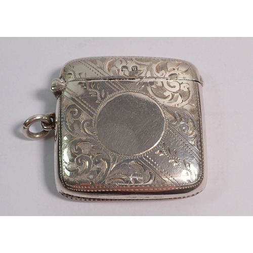 345 - A silver vesta case with engraved decoration,  Birmingham 1919 by Burrows & Son,